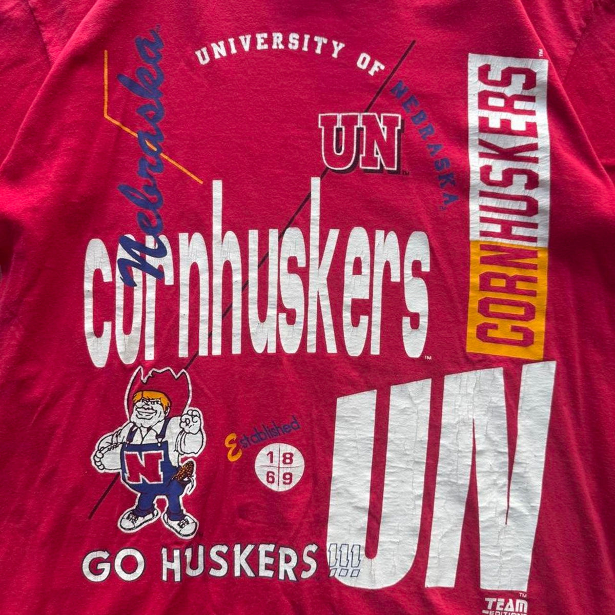 Vintage 90s Nebraska Huskers Herbie All Over Print T-Shirt - OSFA
