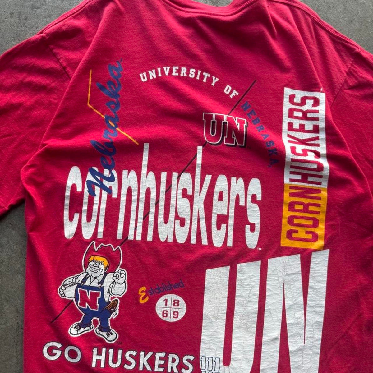 Vintage 90s Nebraska Huskers Herbie All Over Print T-Shirt - OSFA